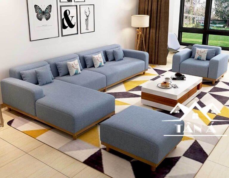 Sofa góc L chân gỗ vuông thấp khi bài trí trong phòng khách đem đến một màu sắc vừa mới mẻ với thiết kế hiện đại, vừa có nét truyền thống hợp với không gian gia đình.